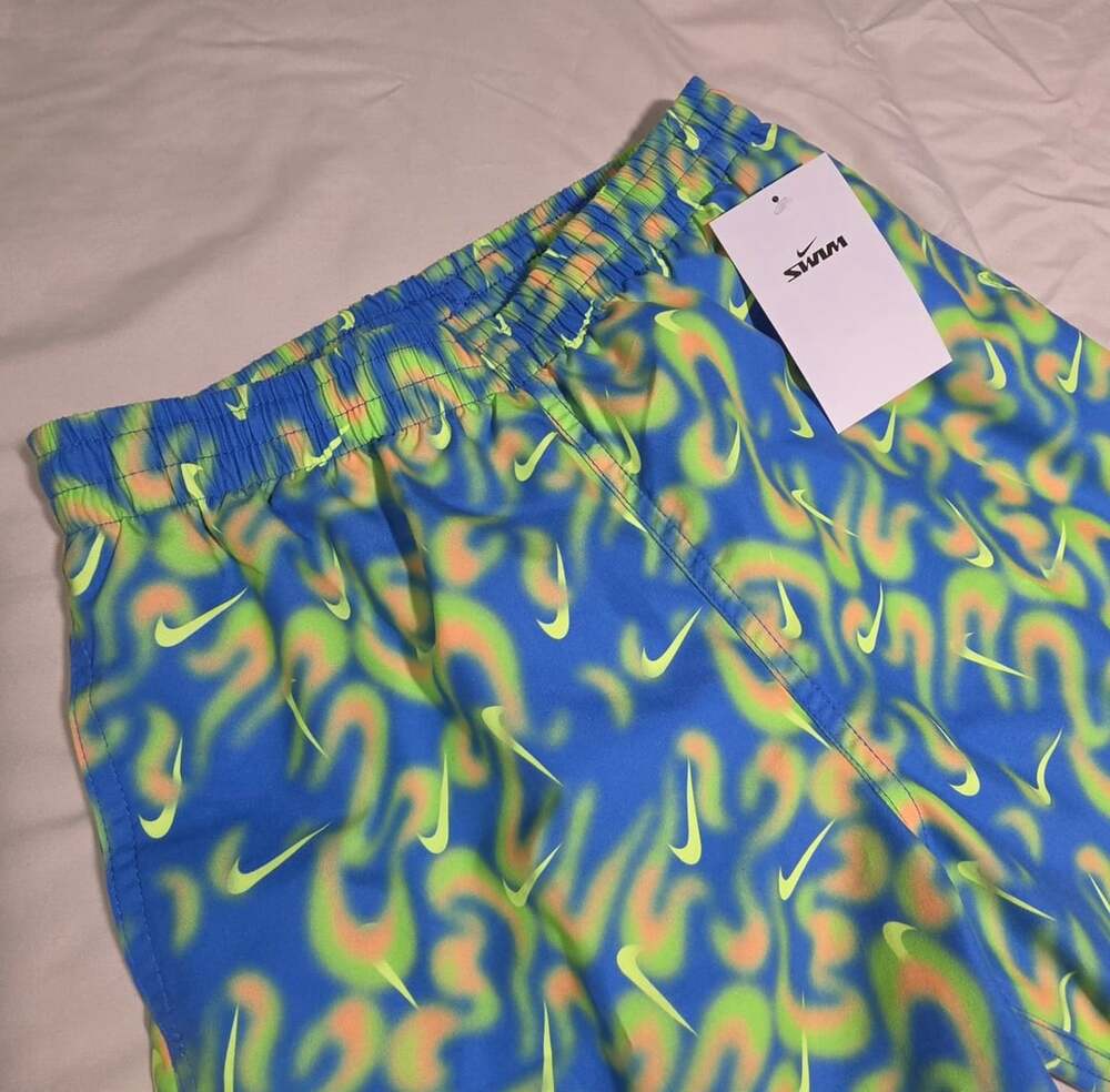 NWT Nike Swim Shorts Size Youth L Blue Allover Swoosh Print Volley Trunks